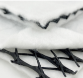 How Permeable Geotextiles Improve Drainage in Construction